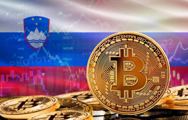 Investors in cryptocurrency and Blockchain Technology in Slovenia, Concept. Bitcoin with Slovenia flag in the background