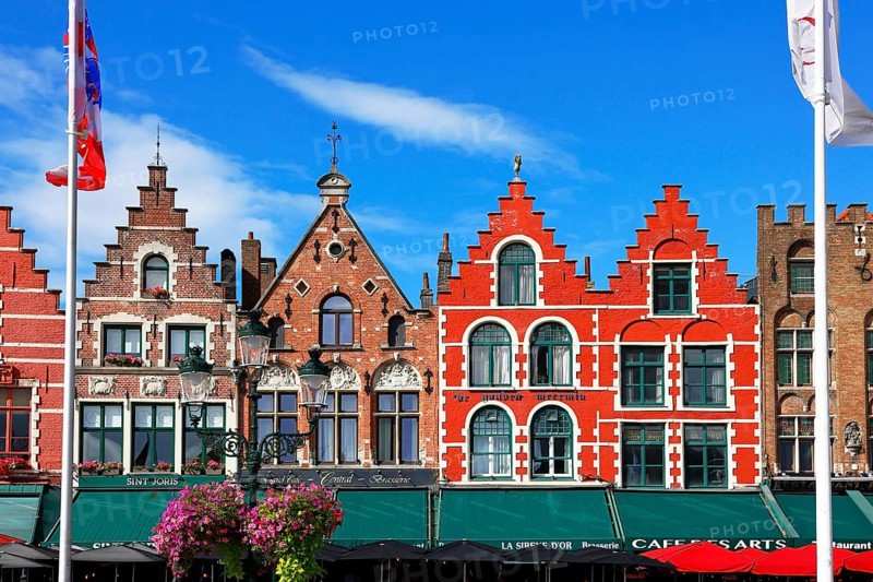Historic houses on the market square in the old town of Bruges, Grote Markt, former guild houses, now restaurants and cafes, UNESCO World Heritage Site, Flanders, Belgium