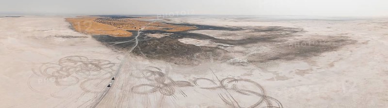 Aerial view, tire tracks on a salt pan, arid landscape, Botswana