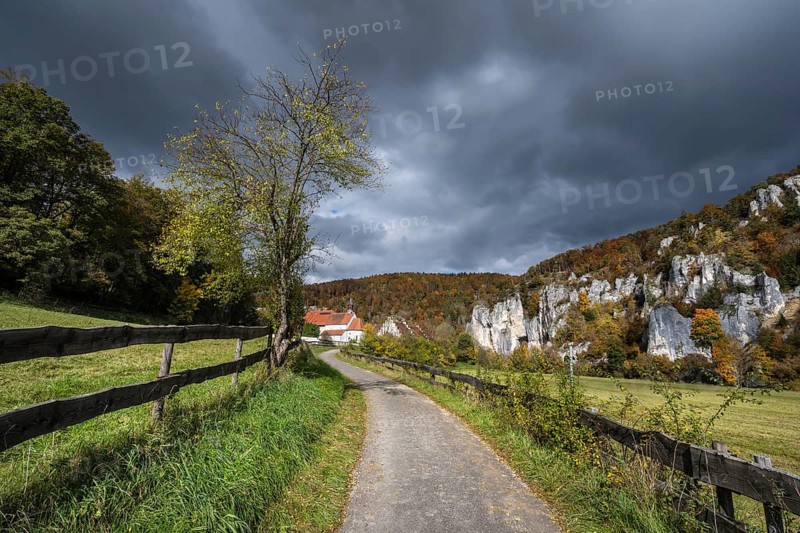 Käppeler estate with St. George's Basilica near Thiergarten in the upper Danube Valley, surrounded by autumn vegetation, Sigmaringen district, Baden-Württemberg, Germany