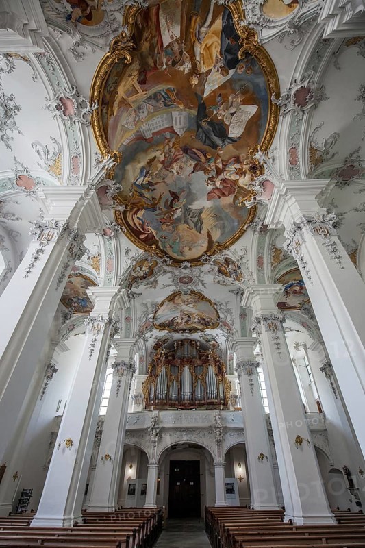 St. George and James Catholic Church, interior view, nave with ceiling frescoes and organ, Isny, Allgäu, Baden-Württemberg, Germany