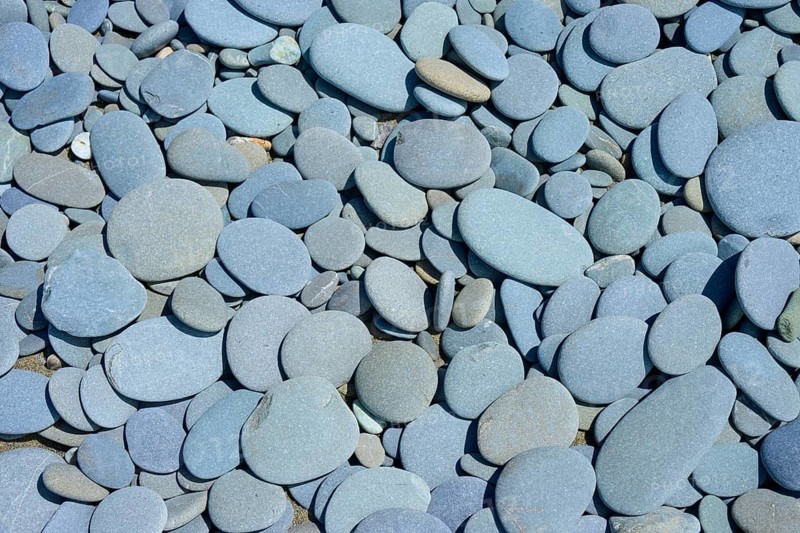 Close-up of smooth grey stones on the beach, Tuhawaiki Point Lighthouse or Jack's Point Lighthouse, Scarborough, Timaru, South Island, New Zealand