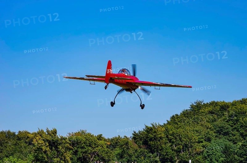 A Soviet Jakovlev Jak-55 sport aircraft with the registration LY-TOY during a flight demonstration as part of an air show on Rossfeld in Metzingen-Glems, Baden-Württemberg, Germany, for editorial use only