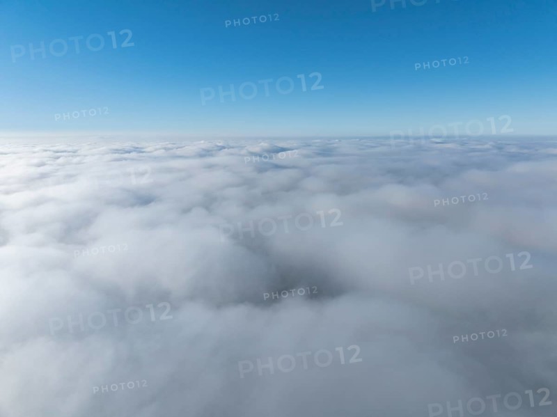 Aerial view, clouds of fog, fog cover seen from above, with clear blue sky, Germany