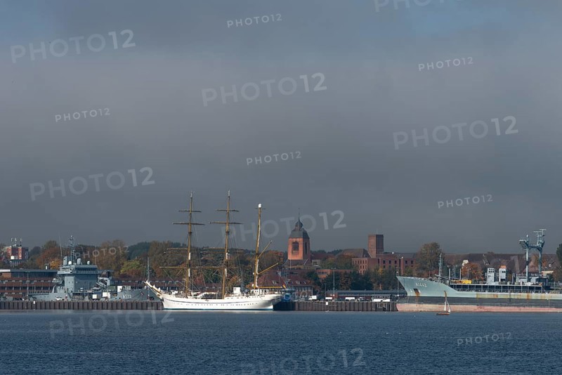 Kiel naval port, district of Wik, sailing school ship Gorch Fock in their home port, fuel transporter A1442 Spessart of the German Navy, supply ship A512, tower of the Garrison Church of St. Peter's Church, Schleswig-Holstein, Germany