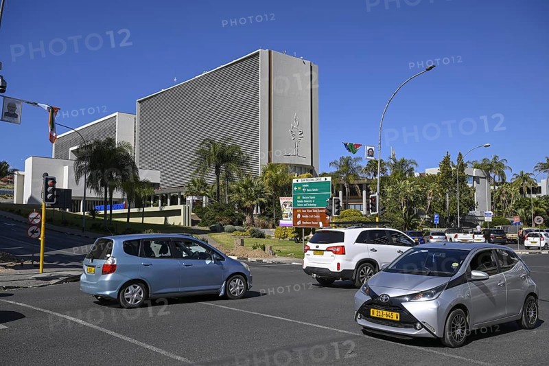 Street scene on the corner of Sam Nujoma Drive/Independence Avenue, in the background the city administration building, Windhoek, Khomas region, Namibia