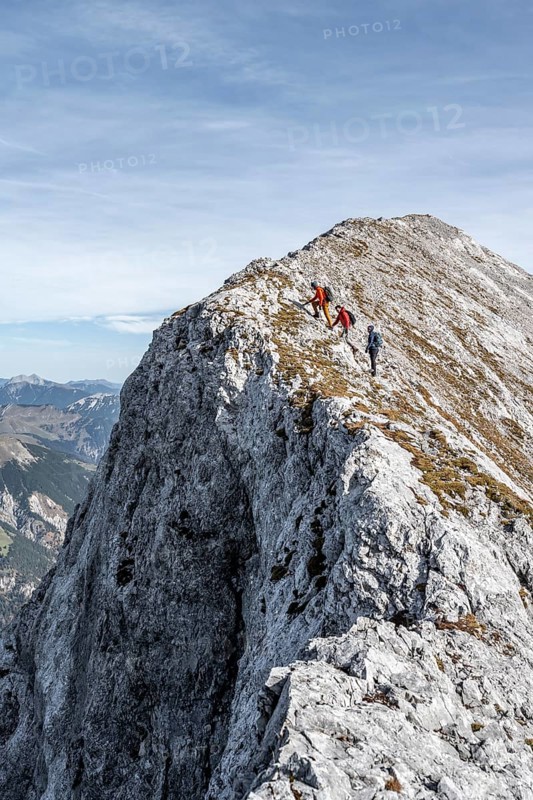 Mountaineer on the ridge of the Gamsjoch, transition to the main summit of the Gamsjoch, in autumn, Rißtal in the Eng, Karwendel, Tyrol, Austria