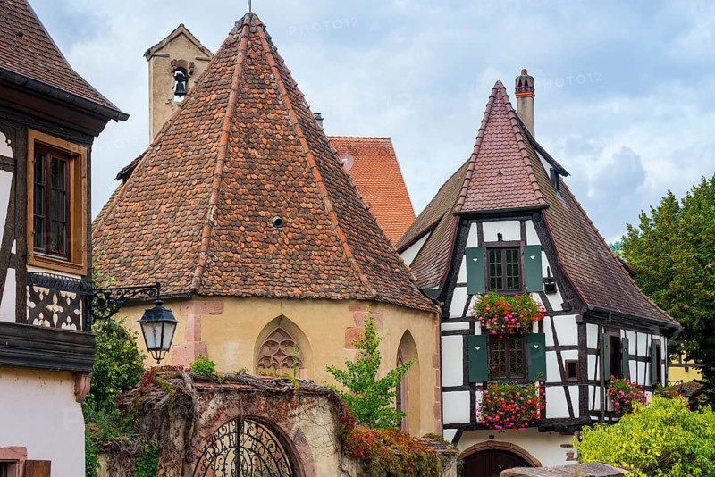 Picturesque Kaysersberg with half-timbered houses in the old town centre