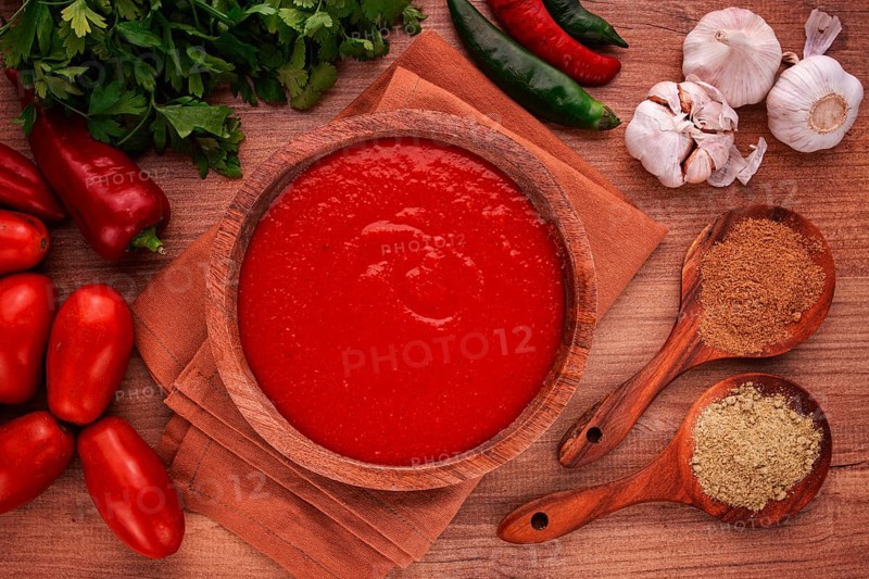 Georgian sauce, Satsebeli sauce, tomato and sweet pepper sauce, with spices, in a wooden bowl, homemade, no people