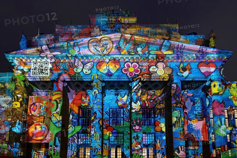 Concert hall Berlin, Gendarmenmarkt, 21st BERLIN FESTIVAL OF LIGHTS, motto Let's Shine Together, light installations, 8 October 2025, Berlin, Germany, opening day in the drizzle, art action The Hands of Berlin< english> 21st BERLIN FESTIVAL OF LIGHTS, motto Let's Shine Together, light installations, October 8, 2025