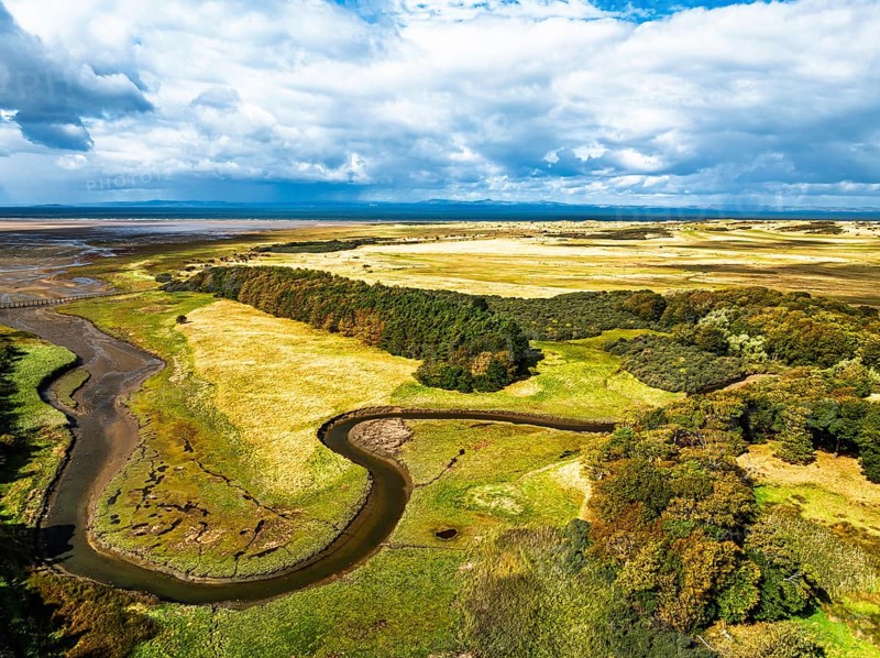 Marshes over Aberlady Bay and Peffer Burn from a drone, Luffness Castle, Aberlady, East Lothian, Scotland, UK