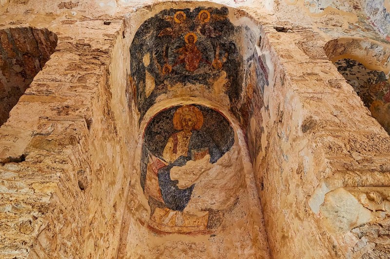 Church of Agia Sophia from the 14th century AD, Ancient frescoes on a wall depicting religious scenes, Mystras, Mistra, UNESCO World Heritage Site, Medieval Byzantine ruined city, north-west of Sparta, foothills of the Tyagetos Mountains, Peloponnese, peninsula, Greece