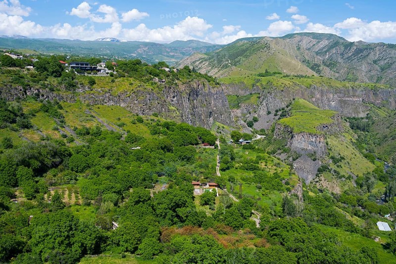Sweeping view of gorge with scattered houses and lush greenery, Garni Gorge, Azat River, Kotayk Province, Armenia