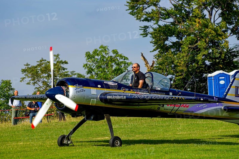 A Jakovlev Jak-55 with the registration LY-AGL during a flight demonstration as part of an air show at the Rossfeld in Metzingen-Glems, Baden-Württemberg, Germany, for editorial use only