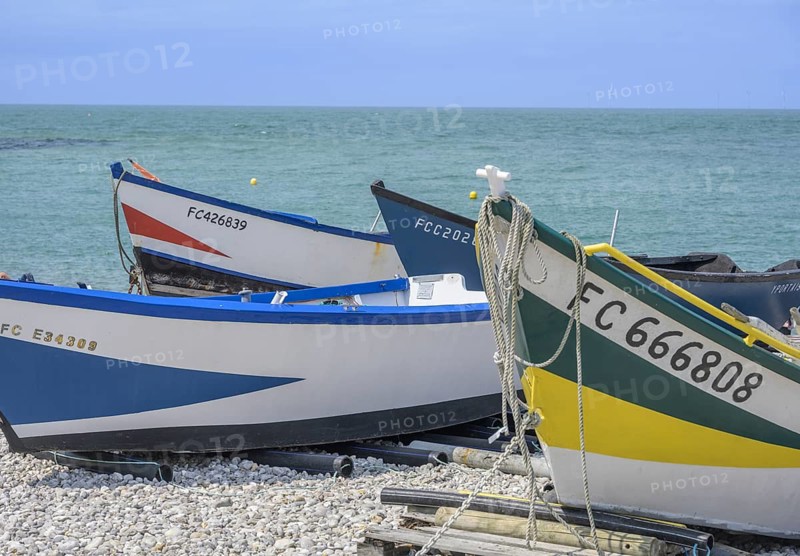 Simple wooden boats on the beach of, Yport, Département Seine-Maritime, France