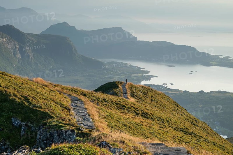 Hikers on Rørsethornet stone staircase, with 3292 steps one of the longest continuous stone staircases in the world, Sherpatreppe or Midsundtreppe or Midsundtrappene, Rørsethornet hike, Otroya or Otrøya island, Møre og Romsdal, Norway