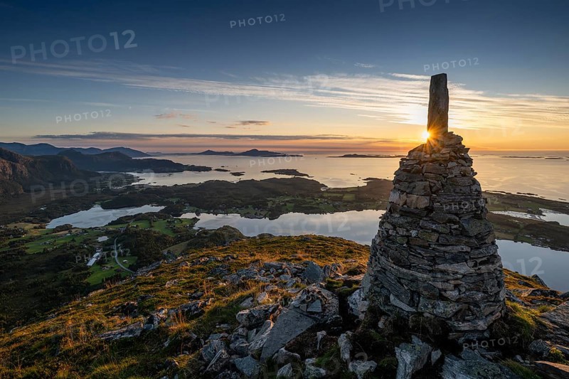 View of the Norwegian coast from the Rørsethornet stone steps, with 3292 steps one of the longest continuous stone steps in the world, Sherpat stairs or Midsund stairs or Midsundtrappene, Rørsethornet hike, cairns, sunset, Otroya or Otrøya island, Møre og Romsdal, Norway