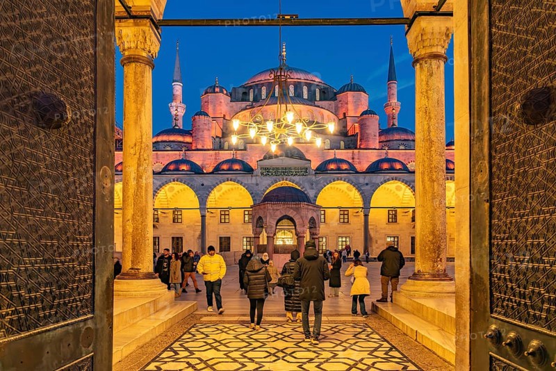 Inner courtyard of the Blue Mosque or Sultan Ahmed Mosque at dusk, Istanbul, Turkey