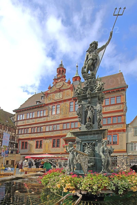 Neptune Fountain with sculpture of Neptune Roman god of the sea with trident, Renaissance Town Hall, Am Markt, Tübingen, Neckartal, Baden-Württemberg, Germany