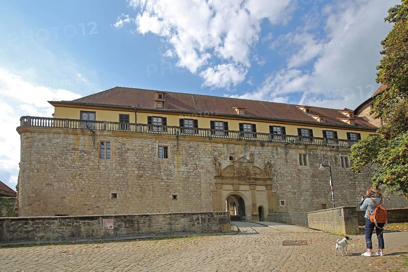 Portal and entrance with tourist taking a photo, castle gate, Hohentübingen Castle, Tübingen, Neckar Valley, Baden-Württemberg, Germany