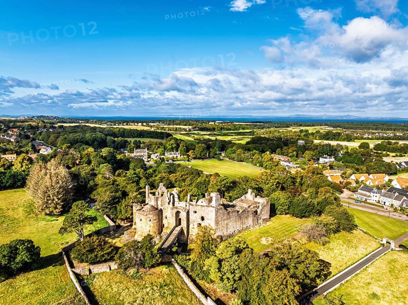 Ruins of Dirleton Castle & Gardens from a drone, Dirleton, East Lothian, Scotland, UK