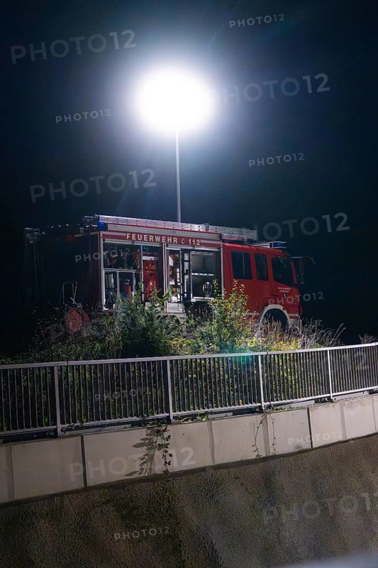 Fire engine under strong spotlight near a railing, fire drill in the new tunnel of the Hermann Hesse railway, Ostelsheim, district of Calw, Germany