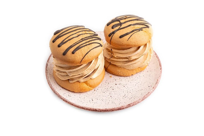 Caramel Cream Cakes isolated on white background, side view, close up