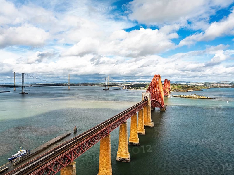 Forth Bridge from a drone, Queensferry Crossing, Forth Estuary, Scotland, United Kingdom