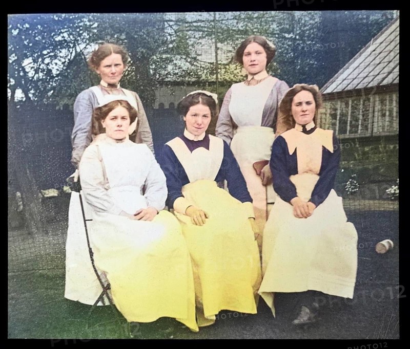 Group portrait of female domestic staff nursemaids servants, British social history c 1900, 1910s, 1920s, 1930s colourised