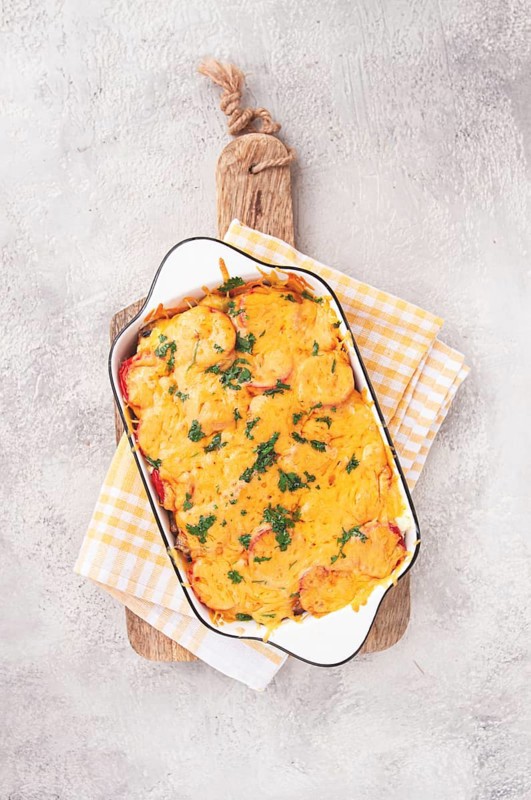 Madame Bovary's Georgian dish, chicken fillet with mushrooms, tomatoes and cheese, baked in a mold
