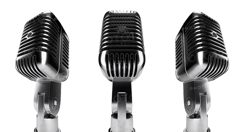 Classic vintage microphone set with black inside mesh isolated on a white background
