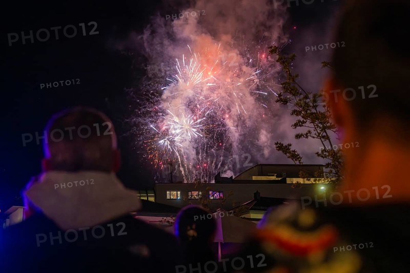 People watching fireworks in the night sky with smoke, Fire Night, Sindelfingen, Germany