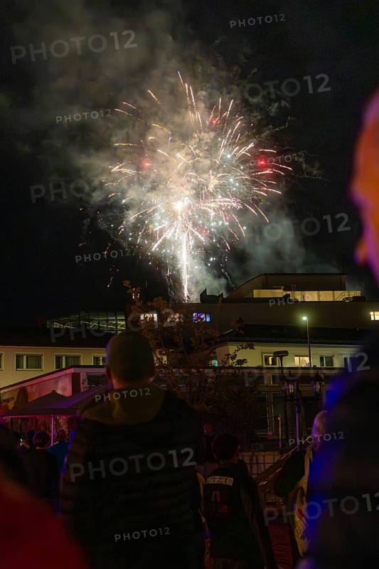 Spectacular fireworks illuminate the night sky during a celebration, people watch fascinated, Fire Night, Sindelfingen, Germany