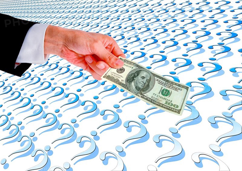 Symbolic image, hand reaches out 100-dollar note, dollar continues to be leading currency or crashes, political security, purchasing power, stable currency, currency war, Wall Street and Dax upswing, President Trump's erratic decisions, global tariffs, tariffs, share prices, euro, euro exchange rate, euro high, exchange rates, dollar parity, investment, recession worries, inflation, exports, raw materials and primary products in dollars, oil in dollars, world crisis, Ukraine war, Germany, loss of democracy, autocracy, China, Russia