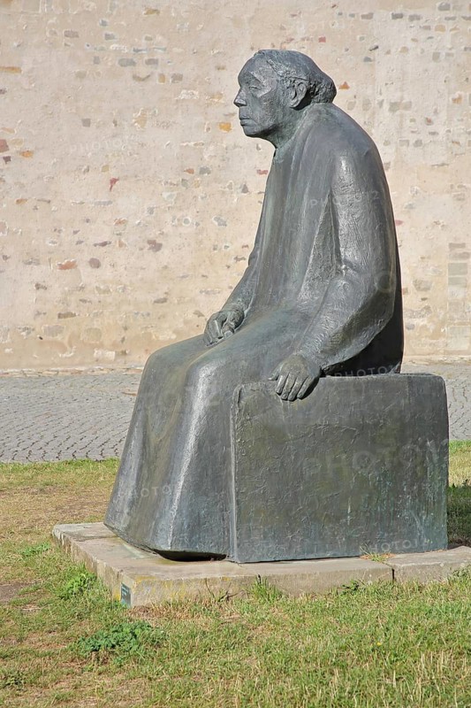 Sculpture Käthe Kollwitz by Gustav Seitz 2010, monument to the paintress, sculptor, seated female figure, bronze sculpture, modern art life-size, sculpture park, Magdeburg, Saxony-Anhalt, Germany