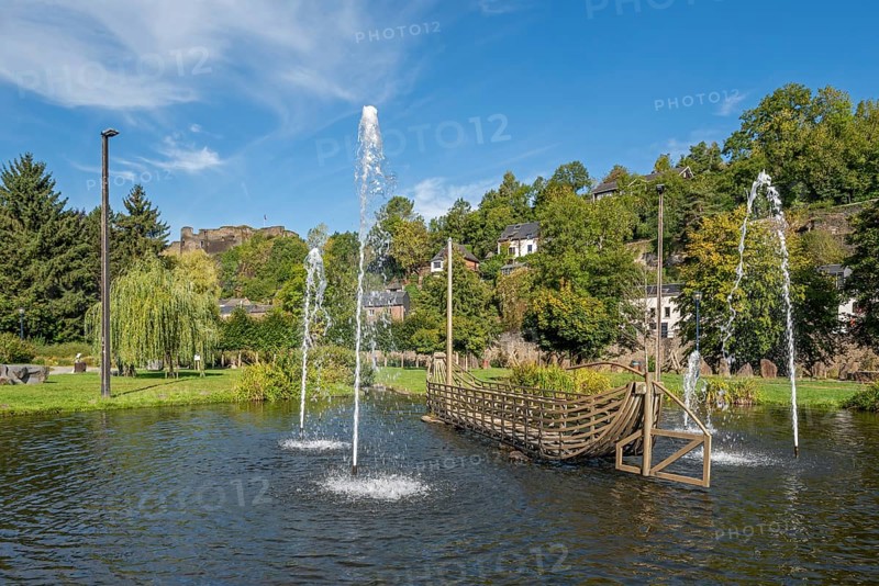 Rompré city park and ruined medieval castle in the town La Roche-en-Ardenne in summer, province of Luxembourg, Ardennes, Wallonia, Belgium