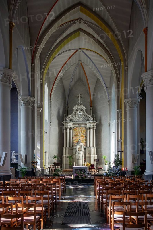 Altar of the 19th century Gothic Revival Saint Martin church in the village Beauraing, province of Namur, Wallonia, Belgium