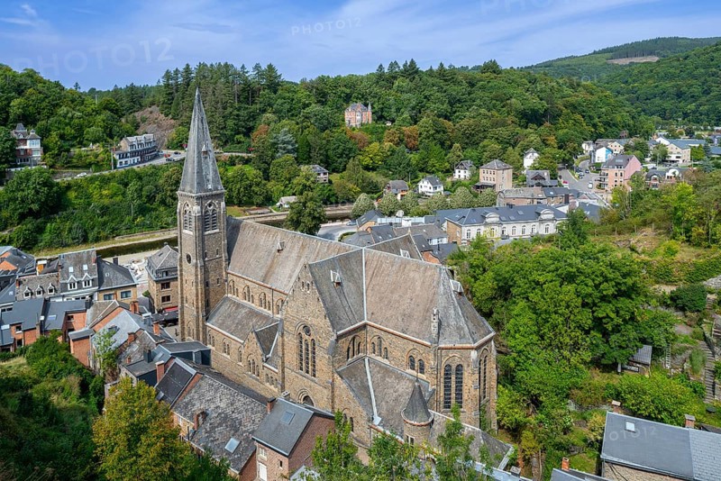 St. Nicholas Church seen from the castle ruins in the city La Roche-en-Ardenne in summer, province of Luxembourg, Ardennes, Wallonia, Belgium