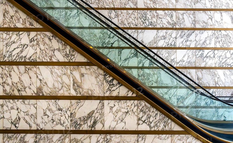 Escalator in the foyer of the Meoclinic, private practices in Friedrichstraße, Berlin, Germany