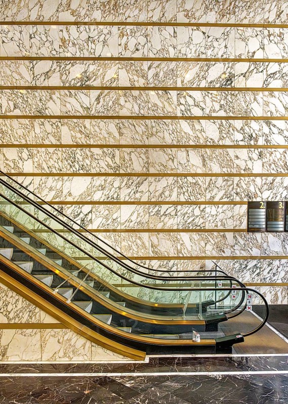 Escalator in the foyer of the Meoclinic, private practices in Friedrichstraße, Berlin, Germany
