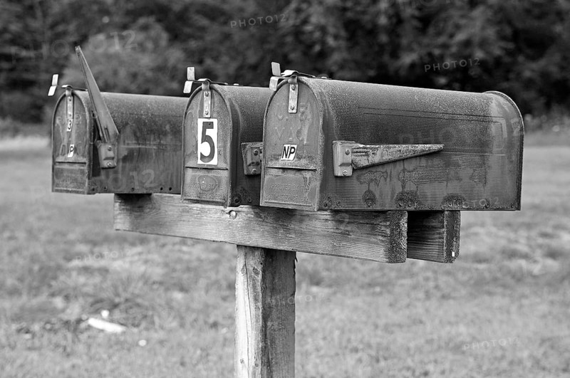 Rusty, private mailboxes on a country road, black and white, Walpack, New Jersey, USA