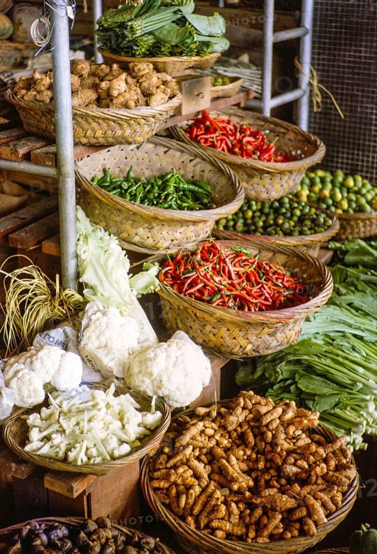 Market stall selling vegetables inside new market building, Johor Bahru, Jahor, Malaya, Malaysia, south east Asia, 1965