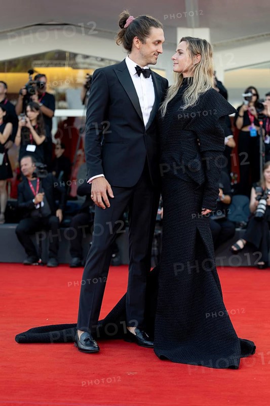 Venice, Italy - 2 September 2025: Rory St. Clair Gainer, Rebecca Ferguson during the Red Carpet of - A house of Dynamite - during the 82nd Venice International Film Festival