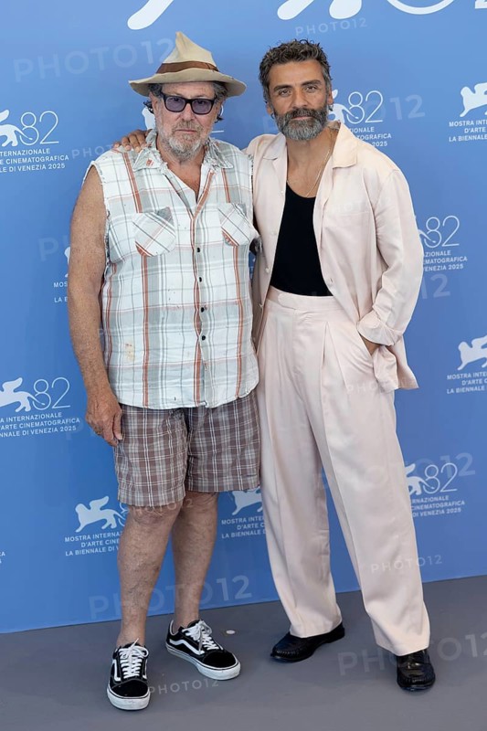 Venice, Italy - 3 September 2025: Julian Schnabel and Oscar Isaac during the Photo Call of - In the Hand of Dante - during the 82nd Venice International Film Festival