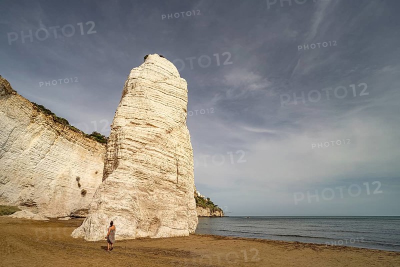 Pizzomunno rock on the Spiaggia di Castello beach in Vieste, Gargano, Apulia, Italy