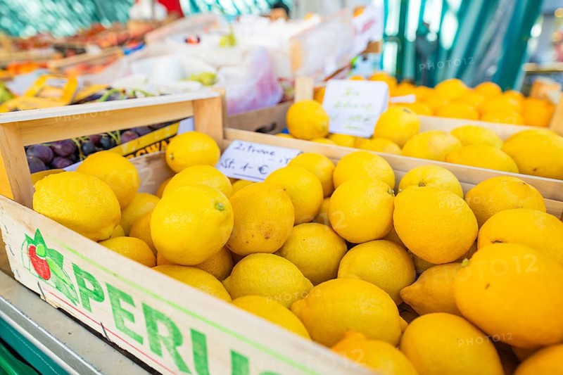 Lemons in a wooden crate at a lively market, Sindelfingen, Böblingen district, Germany