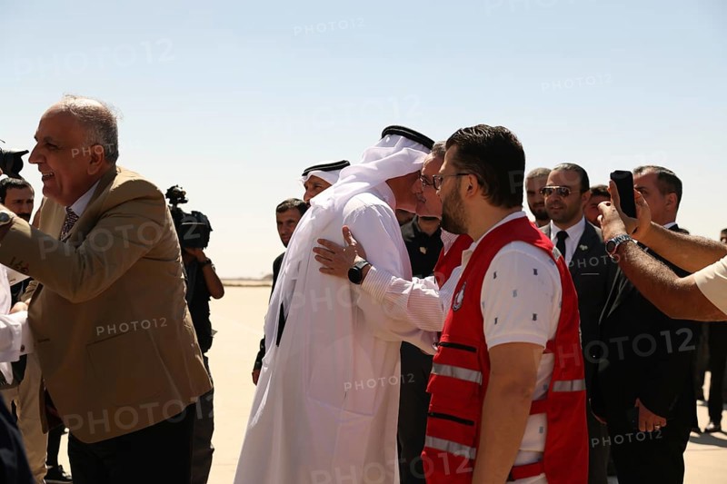 Officials from the Qatari and Syrian Red Crescents receive a Qatari airlift of aid to help the Syrian people, Damascus, Damascus, Syria