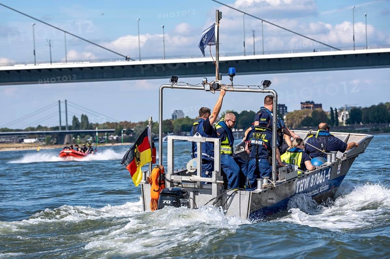 Multi-purpose boat of the THW during a training trip on the Rhine near Düsseldorf, the specialist group for water hazards, this type of boat is used to transport people and goods as a rescue boat and as a working platform, during the major exercise FÜLEX25, lasting several days, of the THW, Technical Relief Organisation, North Rhine-Westphalia regional association, over 3500 volunteers from the 127 North Rhine-Westphalia local associations practise many different deployment scenarios over 4 weekends