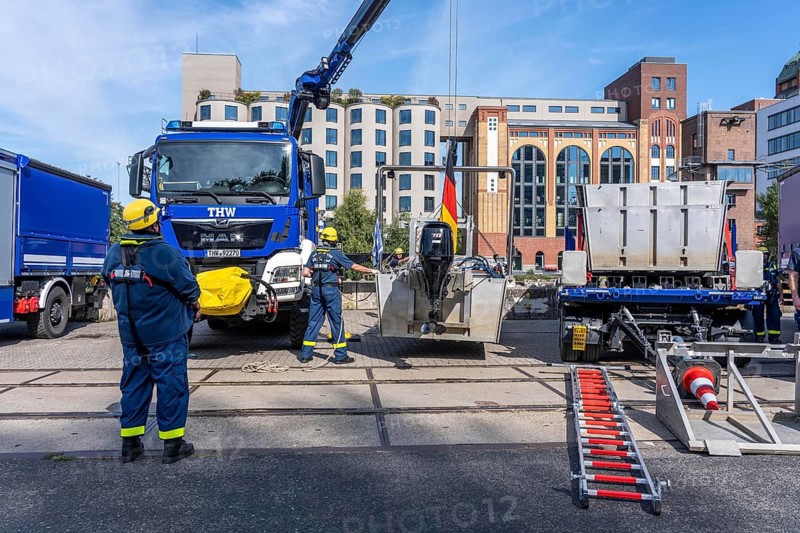 Launching, with crane, of a THW multi-purpose boat in front of a training trip on the Rhine, near Düsseldorf, of the Water Hazards Section, this type of boat is used to transport people and goods as a rescue boat and as a working platform, during the major exercise FÜLEX25, lasting several days, of the THW, Technical Relief Organisation, North Rhine-Westphalia Regional Association, over 3500 volunteers from the 127 North Rhine-Westphalia local associations practise many different deployment scenarios over 4 weekends