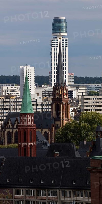 Tower of the old Protestant Church of St Nicholas, the Protestant Church of the Epiphany and the New Henninger Tower, Frankfurt am Main, Hesse, Germany